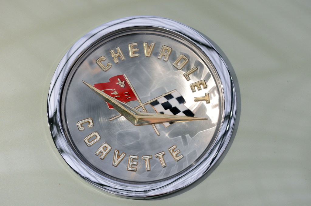 A Chevrolet Corvette logo on a cream background.