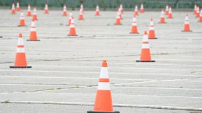 Cones Scattered Throughout Empty Parking Lot