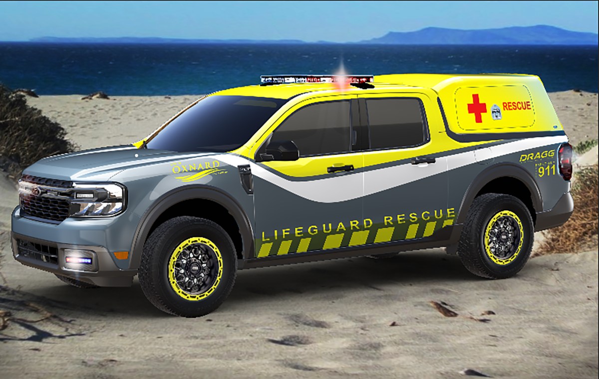 A 2022 Ford Maverick truck custom built by DRAGG as a beach and lifeguard rescue truck with a grey, white, and yellow color scheme, emergency lights, custom wheels with yellow bead locks and tinted windows. This truck will be on display at Ford's booth at SEMA 2021