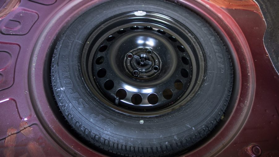 Donut Spare Tire Mounted In Car