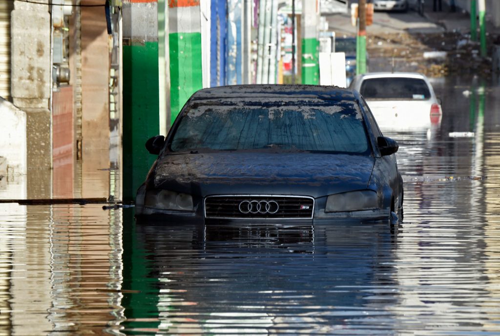 A car partially underwater.