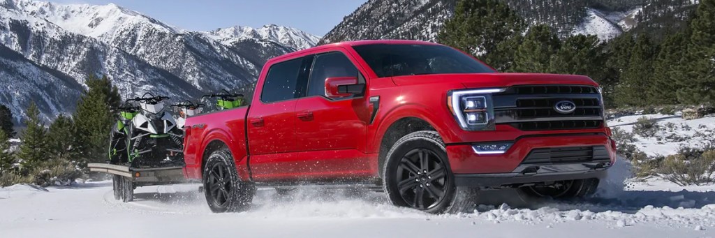 The 2023 Ford F-150 hauling a trailer in the snow