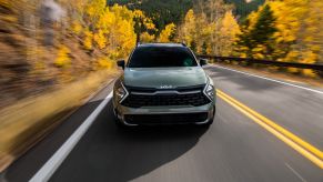 Front view of green 2023 Kia Sportage