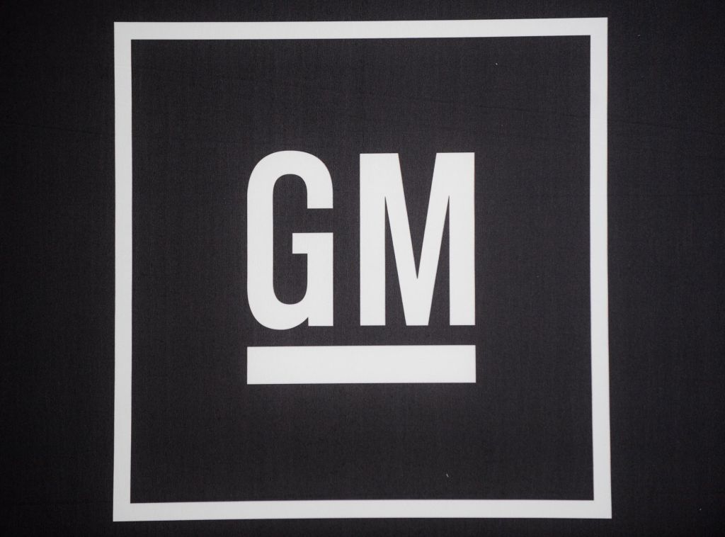 A white GM logo on a black background.