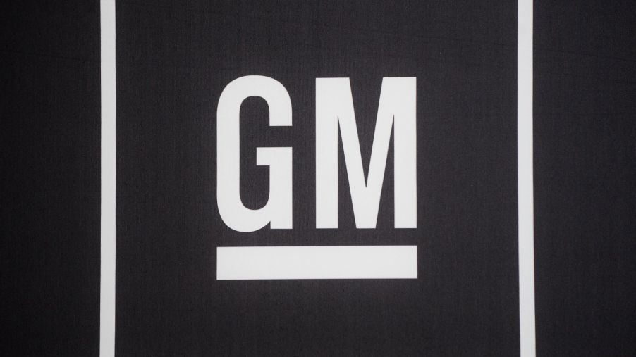 A white GM logo on a black background.