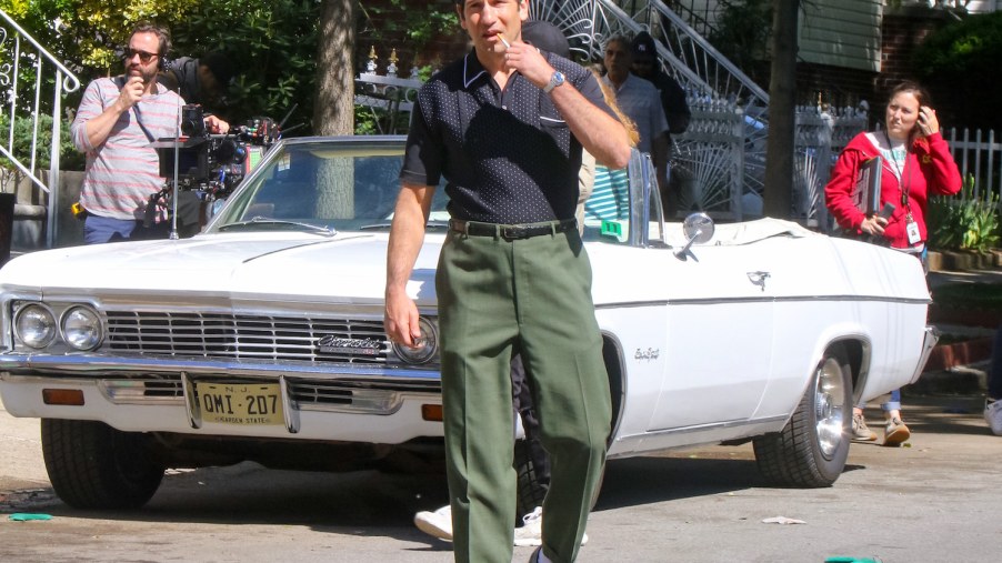 Jon Bernthal on set with the 1966 Chevrolet Impala Super Sport. Bernthal plays Tony Soprano's father in this prequel film. This is just one of the Many Classic Cars in The Many Saints of Newark | Jose Perez/Bauer-Griffin/GC Images