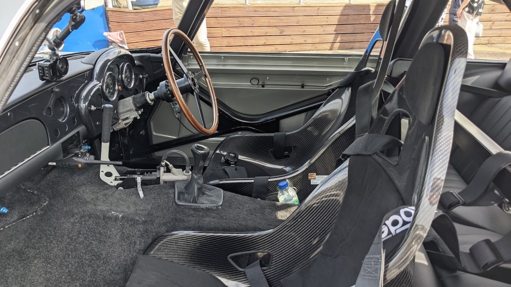 This is the interior of the stunt DB5, with just racing seats and the necessary controls. James Bond Drifts A BMW-Powered 1964 Aston Martin DB5 Replica In 'No Time To Die' | Philip Dethlefs/picture alliance via Getty Images