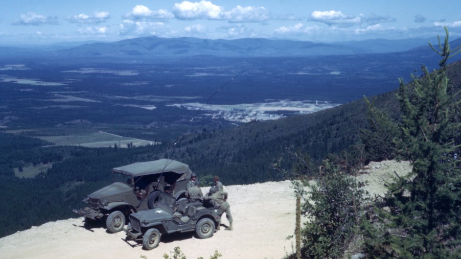 American auto manufacturers pioneered mass-produced four wheel drive (4WD) vehicles during WW2. All wheel drive (AWD) came later. WW2 is important to the history of 4WD vs. AWD | Jim Heimann Collection/Getty Images
