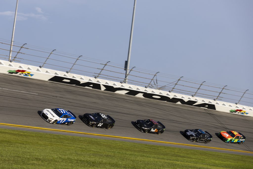 Chris Buescher, Driver of the #17 NASCAR Next Gen car, Joey Logano, Driver of the #22, Denny Hamlin, Driver of the #11, Cole Custer, Driver of the #41, and William Byron, Driver of the #24 test their Next Gen cars' drafting capabilities at Daytona International Speedway in Daytona Beach, Florida. The V8 NASCAR engines powering the Next Gen cars will be allowed to make hundreds more horsepower to battle the advanced aerodynamics of the new vehicles. | James Gilbert/Getty Images
