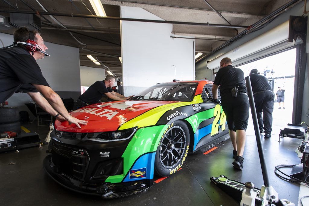 William Byron's #24 Next Gen car in the garage at Daytona. This is our ultimate guide to the 725 horsepower engine, downforce improving aerodynamics, and transaxle transmission of the NASCAR Next Generation car. | James Gilbert/Getty Images