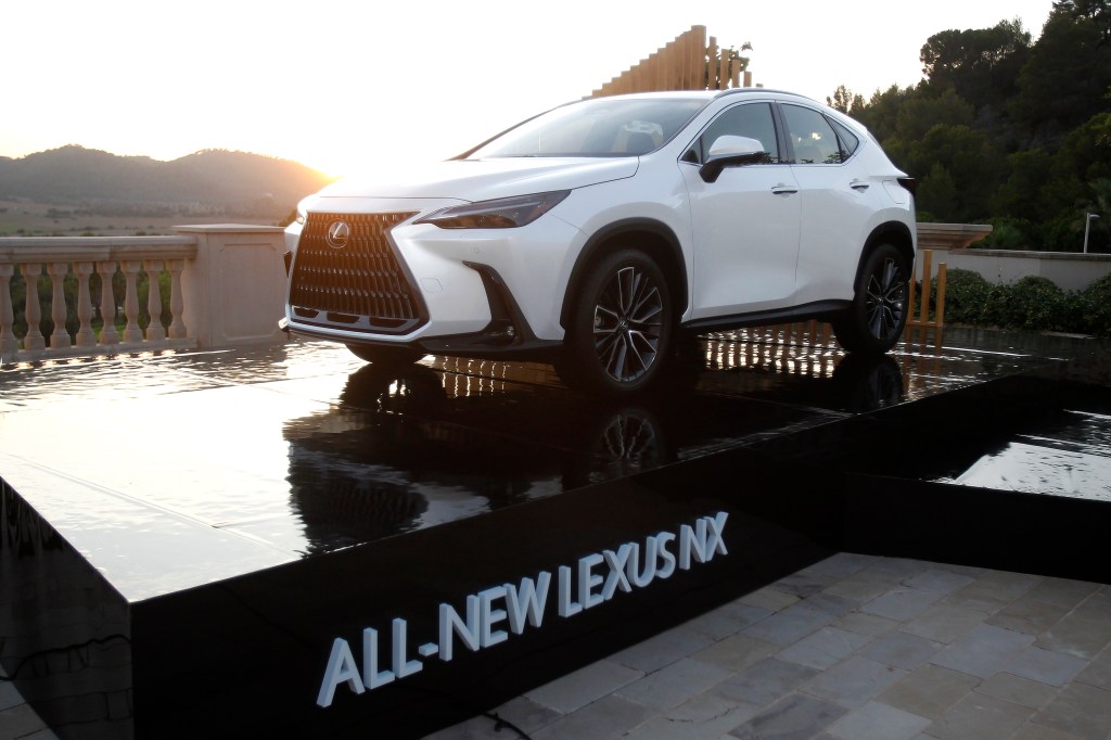 A white Lexus NX, the newest compact SUV to receive a refresh for 2022.