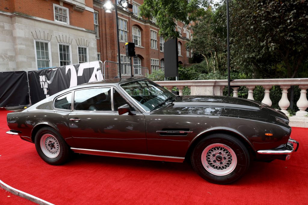 1987 Aston Martin V8 Vantage Volante prop car at the world premier of the new 007 film. James Bond’s ‘New’ 1980s Aston Martin V8 from No Time To Die | Tristan Fewings/Getty Images for EON Productions, Metro-Goldwyn-Mayer Studios, and Universal Pictures