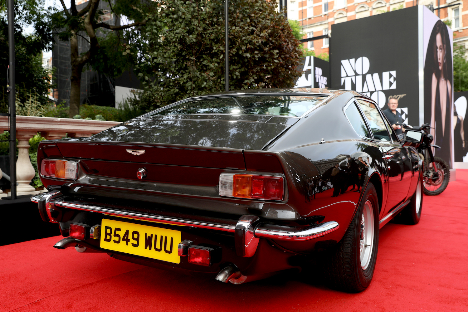 1987 Aston Martin V8 Vantage Volante prop car at the world premier of the new 007 film. James Bond’s ‘New’ 1980s Aston Martin V8 from ‘No Time To Die’ | Tristan Fewings/Getty Images for EON Productions, Metro-Goldwyn-Mayer Studios, and Universal Pictures