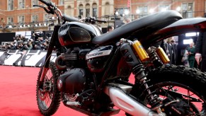 James Bonds Triumph Motorcycle at the World Premiere of "NO TIME TO DIE" The No Time To Die motorcycle completed an incredible two story jump in Matera Italy, using coca-cola | Tristan Fewings/Getty Images for EON Productions, Metro-Goldwyn-Mayer Studios, and Universal Pictures