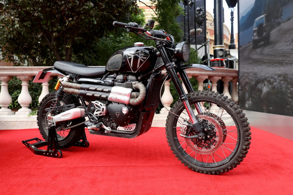 James Bonds Triumph Motorcycle at the World Premiere of "NO TIME TO DIE" The No Time To Die motorcycle completed an incredible two story jump in Matera Italy, using coca-cola | Tristan Fewings/Getty Images for EON Productions, Metro-Goldwyn-Mayer Studios, and Universal Pictures)