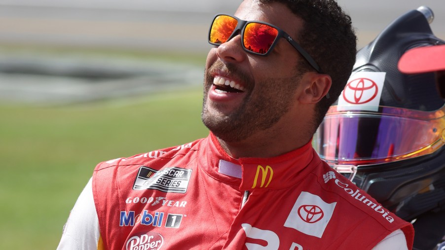 Bubba Wallace, driver of the #23 McDonald's Toyota, stands on the grid prior to the NASCAR Cup Series YellaWood 500 at Talladega Superspeedway on October 04, 2021 in Talladega, Alabama. Here's What Drivers Are Saying About NASCAR's Next Gen Cars. | Chris Graythen/Getty Images