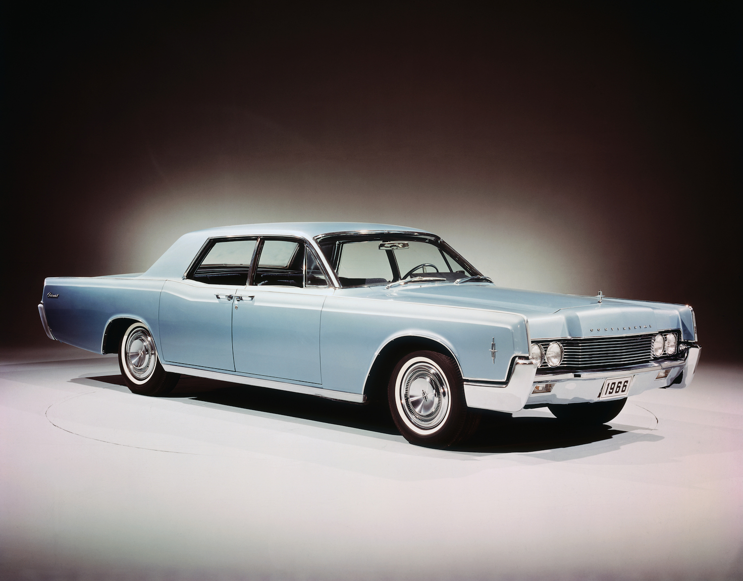 A press release photo of a 1966 Lincoln Continental Four-Door Sedan. A 1969 Lincoln Continental was one of the Many Classic Cars in The Many Saints of Newark. | Bettmann via Getty Images