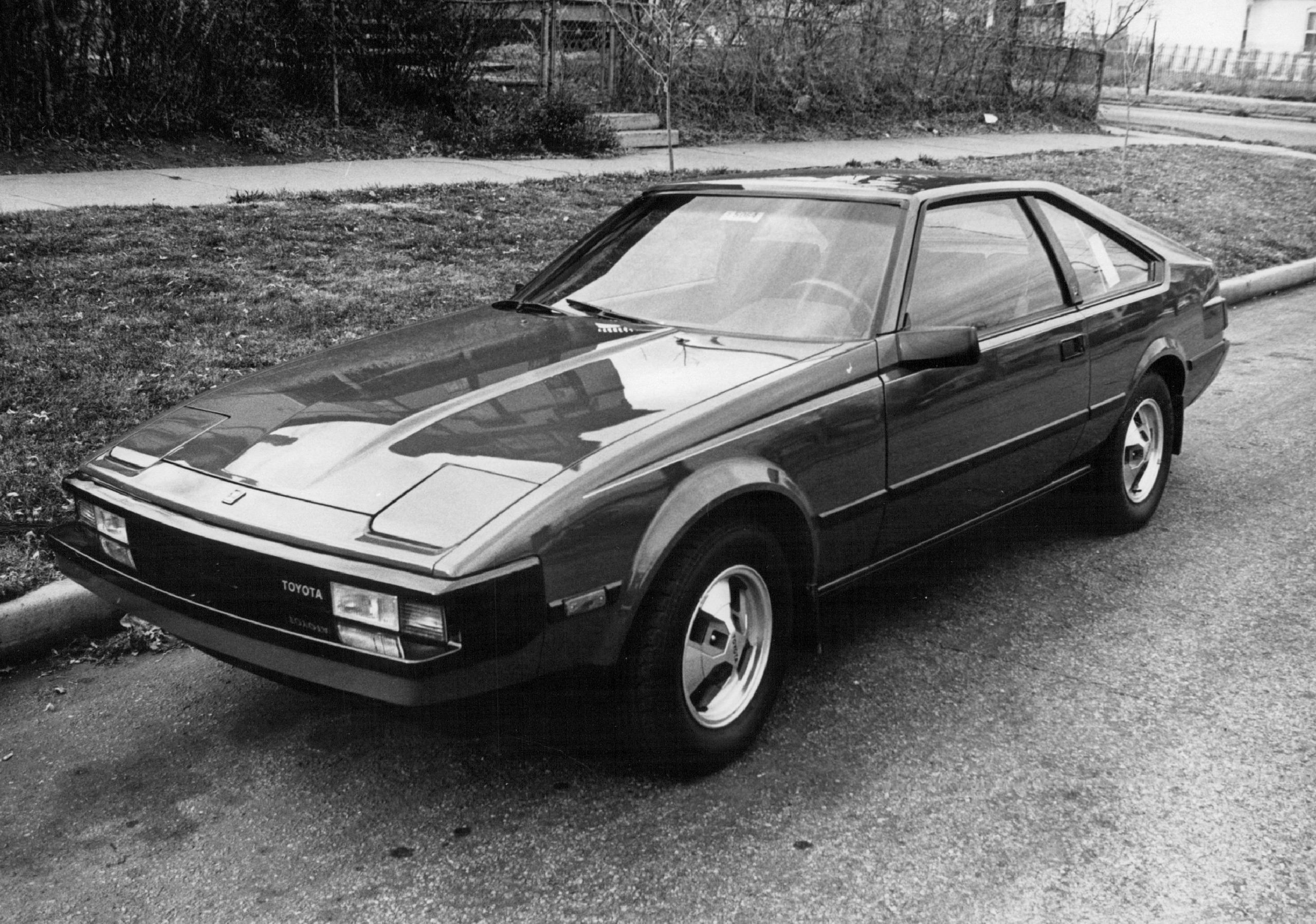 An 1982 Toyota Supra in an old black and white photo. This is a perfect example of a fun and affordable used car with a manual transmission