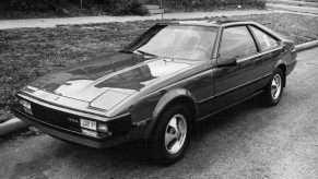 An 1982 Toyota Supra in an old black and white photo. This is a perfect example of a fun and affordable used car with a manual transmission