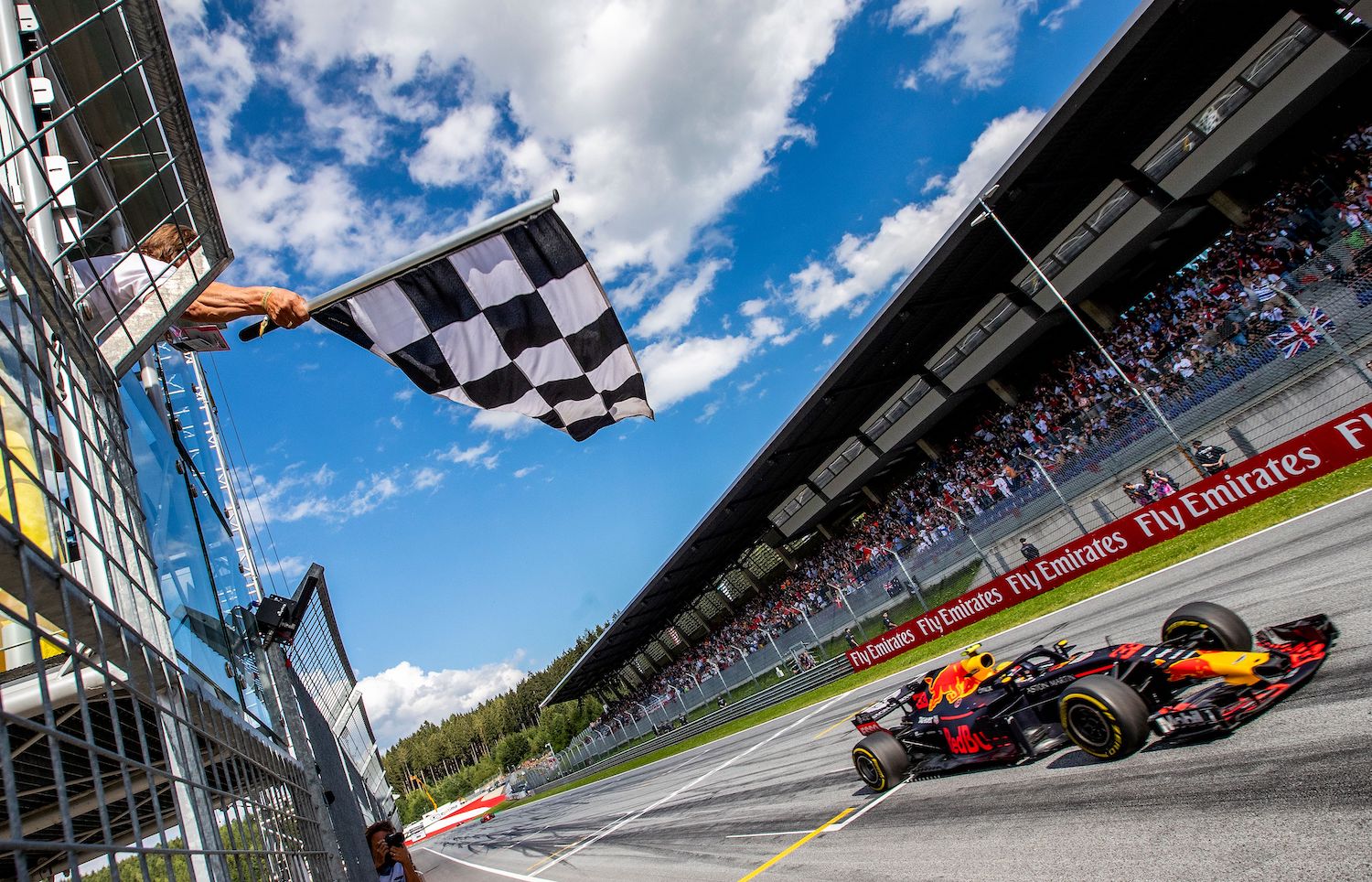 Max Verstappen leading the 2021 season in his Red Bull Honda Racing car. The Formula 1 top speed is over 200 mph. | SRDJAN SUKI/AFP via Getty Images
