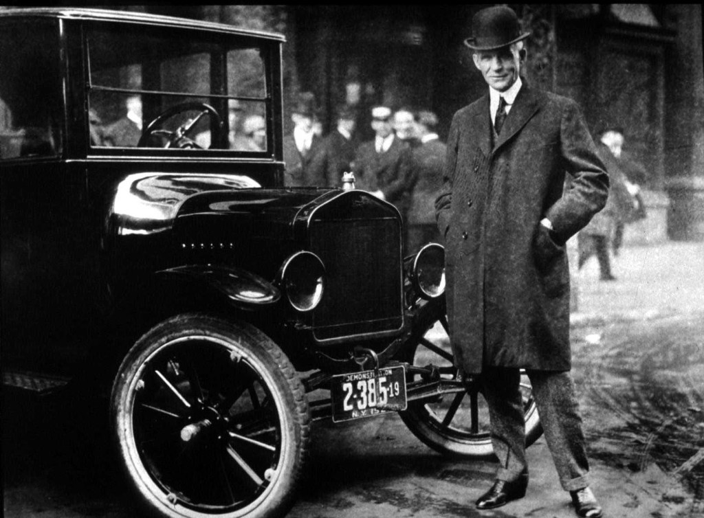 Henry Ford Standing Next To Ford Model T