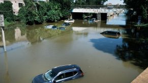 Cars submerge needing insurance claims after hurricane Ida came through.