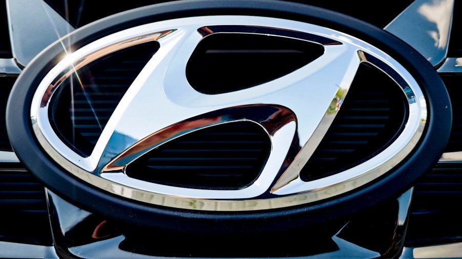 A chrome Hyundai logo on a black grille.