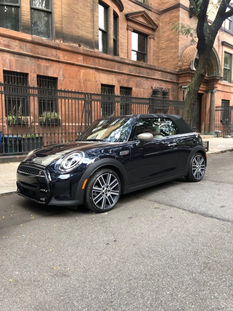 Mini Cooper in Harlem with the top up