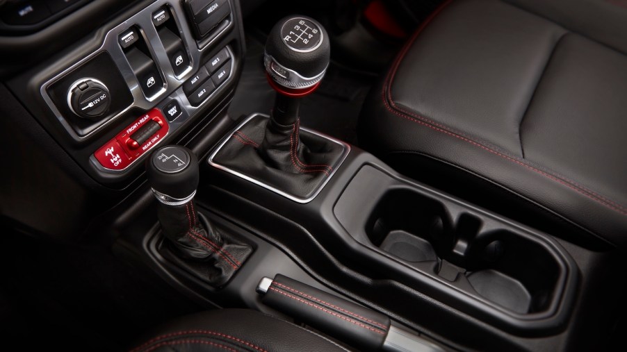 If your vehicle has a 2WD/4WD selector lever, like this 2021 Jeep Wrangler, four wheel drive is best reserved for low speed, low traction situations. It is bad to run 4WD all the time. | Stellantis