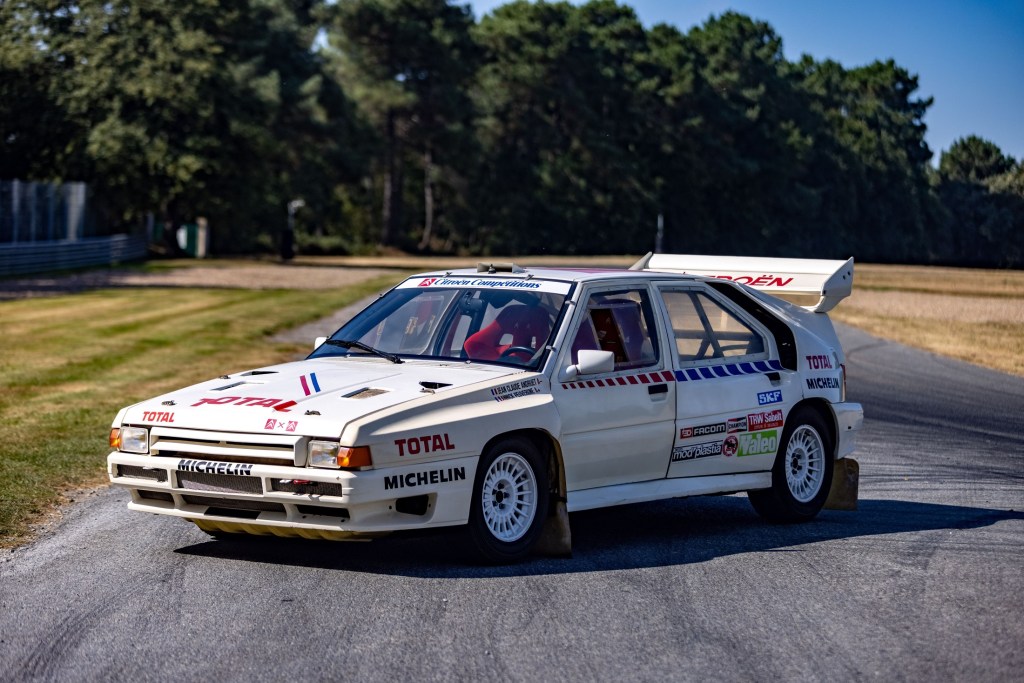 Jean-Claude Andruet's white-with-blue-and-red-stripes 1986 Citroen BX 4TC Evolution race car
