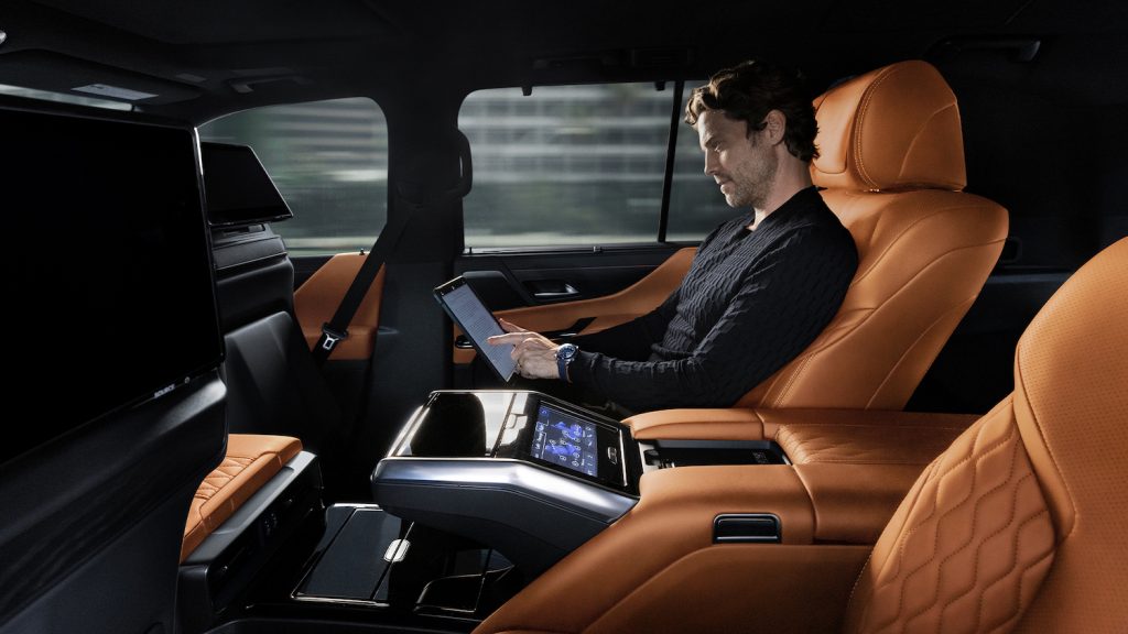 This is a promotional photo of the 2022 Lexus LX 600 ultra luxury interior. The ultra-luxury interior is limited to four huge captain's chairs covered in quilted leather. | Lexus