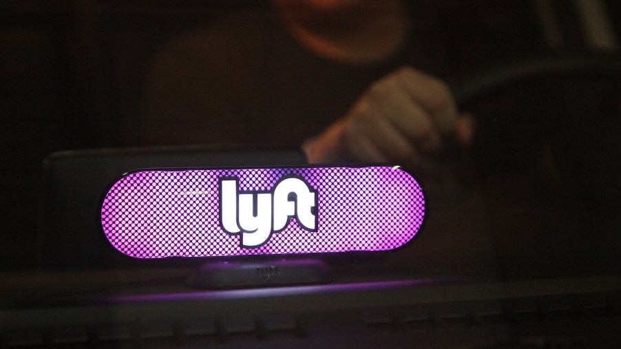 This is a photo of a Lyft rideshare car. The Lyft and Uber safety teams maintain lists of drivers and passengers banned for rape and other crimes. | Kelly Sullivan/Getty Images for Lyft