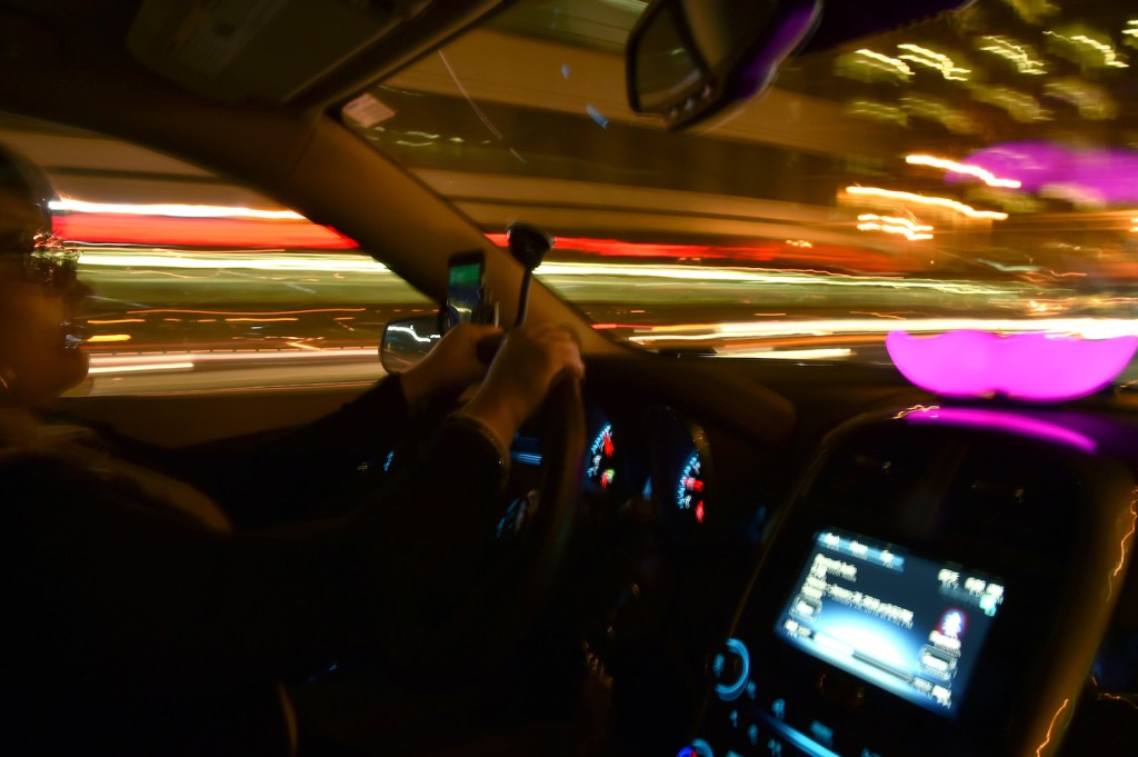 This is a photo of a Lyft driver. The Uber and Lyft safety teams investigate sexual assault and rape reports. | Mike Coppola/Getty Images for Lyft