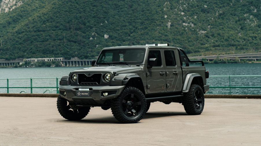 MILITEM-FEROX-T fully modified Jeep Gladiator parked by a body of water