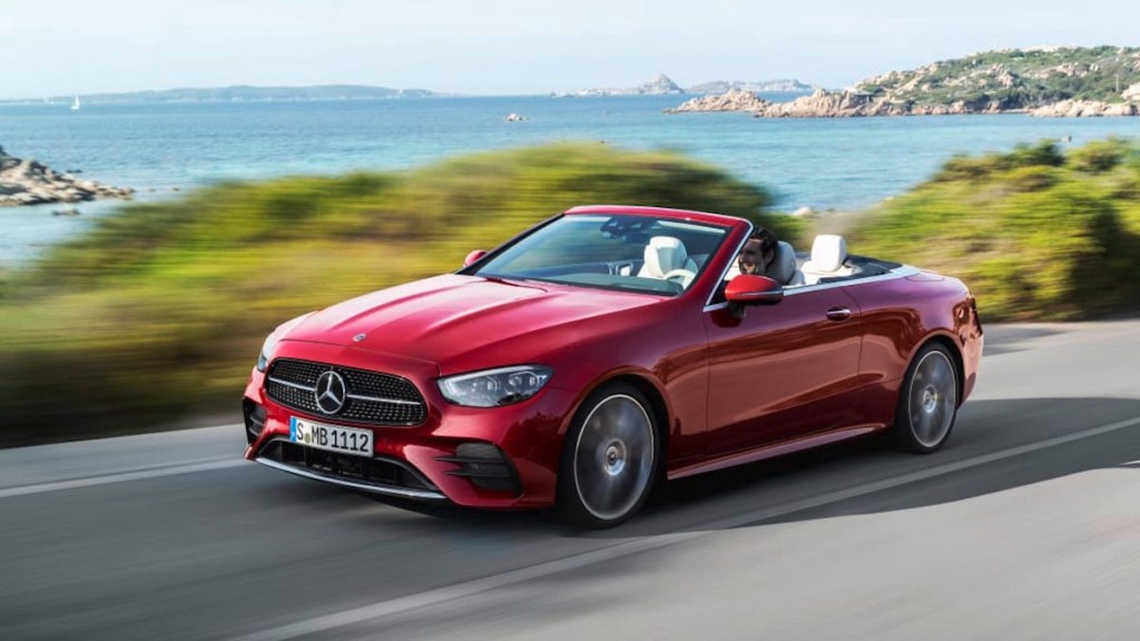 2021 Mercedes-Benz E450 cabriole running down a beach road