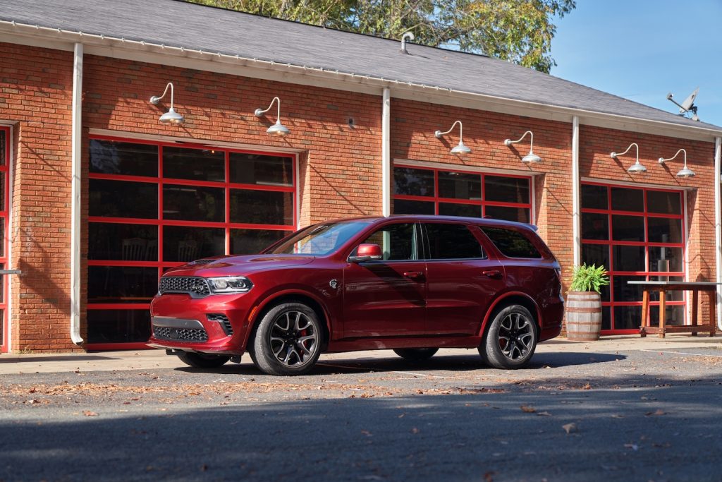 This is a promotional photo of the 2021 Dodge Durango SRT Hellcat in octane red. Dodged may have Killed The Durango Too Soon, the most recent SUV won Multiple Best Midsize SUV 2021 List Awards | Stellantis