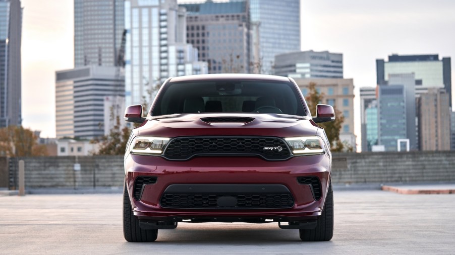 This is a promotional photo of the 2021 Dodge Durango SRT Hellcat in octane red. Dodged may have Killed The Durango Too Soon, the most recent SUV won Multiple Best Midsize SUV 2021 List Awards | Stellantis
