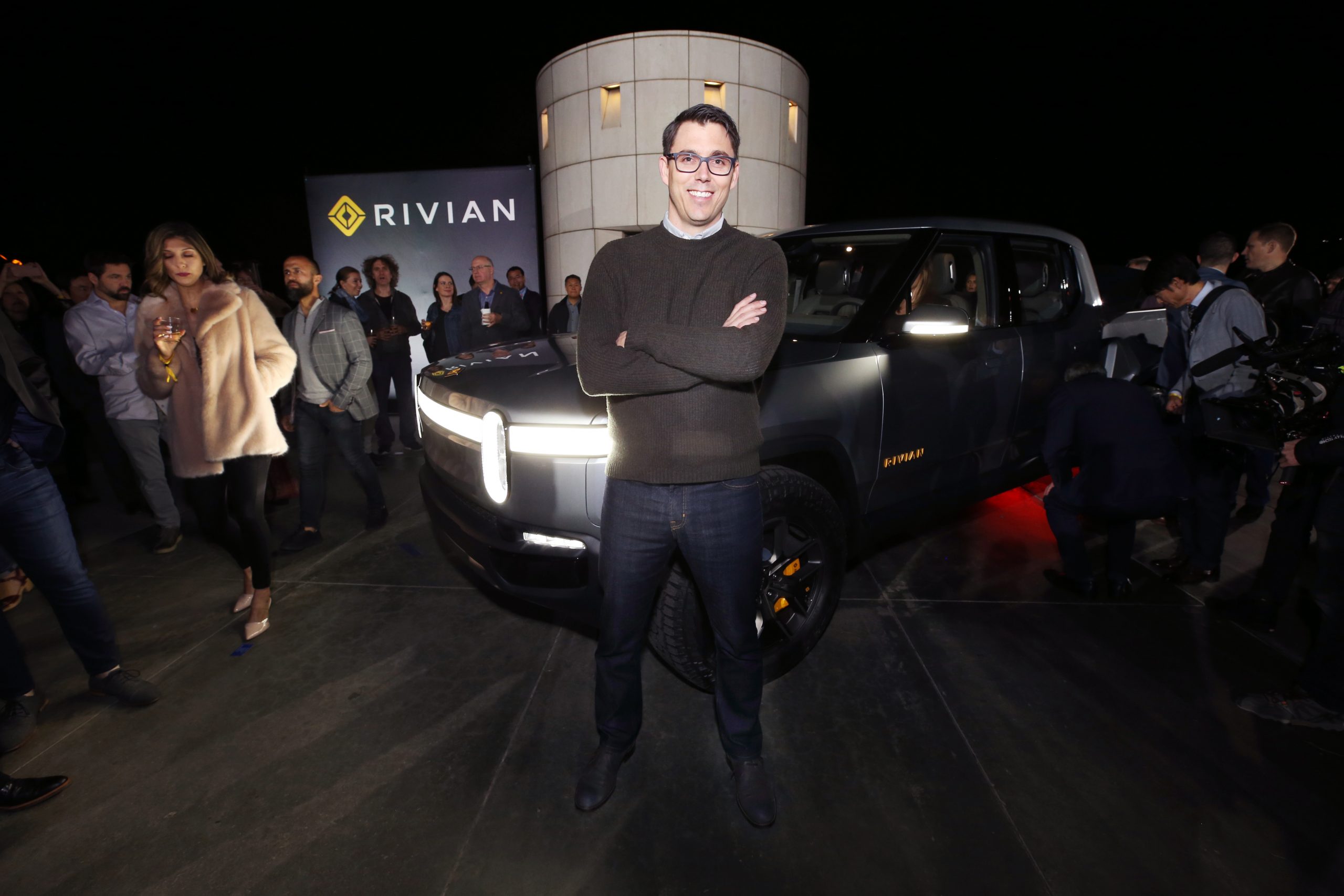 R.J. Scaringe standing in front of Rivian R1T