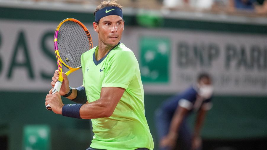 Rafael Nadal playing tennis.