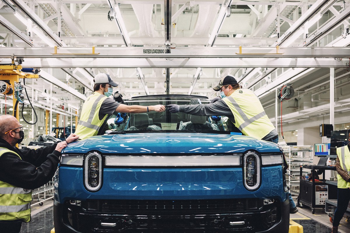 Rivian R1T EV truck on a production line. Rivian is planning to make their own EV batteries in house.