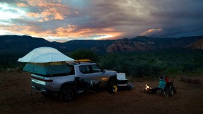 This is a promotional photo of the Rivian R1T camping. Rivian and Motor Trend have Complete dThe First Electric Transcontinental Overland Expedition | Rivian