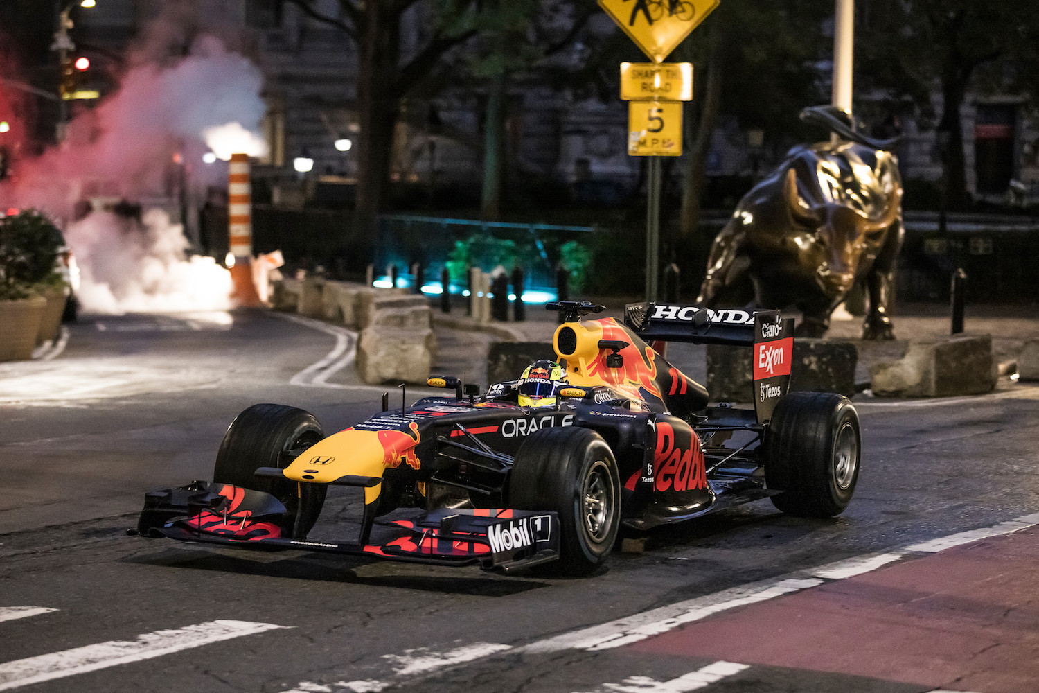 This is a publicity photo of Red Bull Racing's RB7 F1 car in New York City. The driver hooned around Manhattan, revving the engine and even drifting into a parking spot. | Red Bull Racing