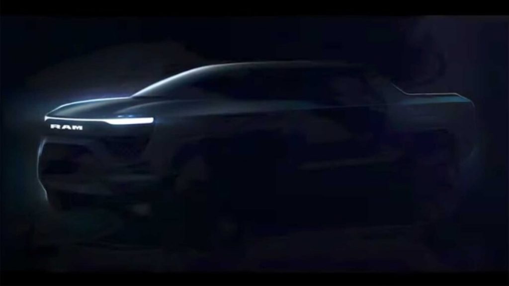 Side view of dark gray Ram 1500 EV electric pickup truck
