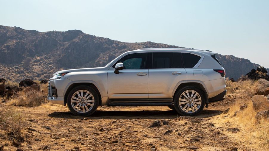 Silver 2022 Lexus LX 600 with mountains in the background