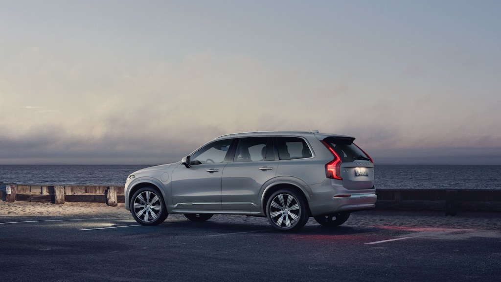 Silver 2022 Volvo XC90 Recharge parked near the ocean