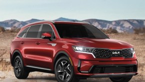 A red 2022 Kia Sorento parked on the plain.