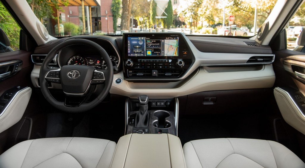 Steering wheel, gauges, and touchscreen in 2022 Toyota Highlander 