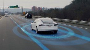 A rendered image of a Tesla Model S using the Autopilot feature. Autopilot is the base on which the Tesla Full Self Driving Beta is built upon
