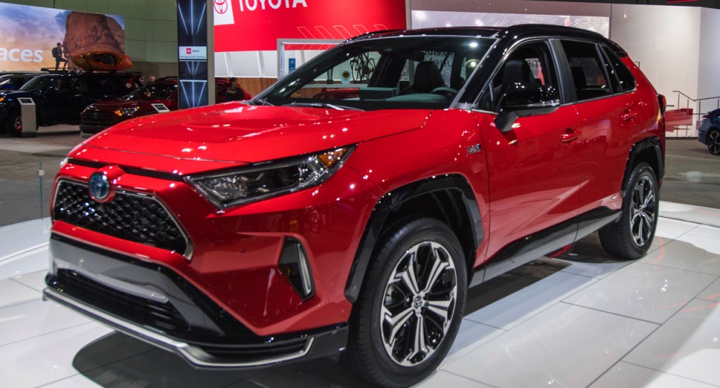 A red 2021 Toyota RAV4 Prime on display during the AutoMobility LA event, at the 2019 Los Angeles Auto Show in Los Angeles, California on November 21, 2019. - The four-day press and trade event precedes the Los Angeles Auto Show, which runs November 22 through December 1.