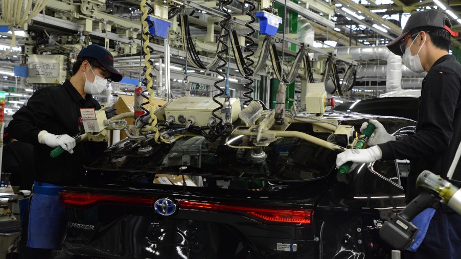 Autoworkers assembling a Toyota Prius at Toyota's Takaoka plant in Japan. Toyota is looking to regain production it lost during the global chip shortage